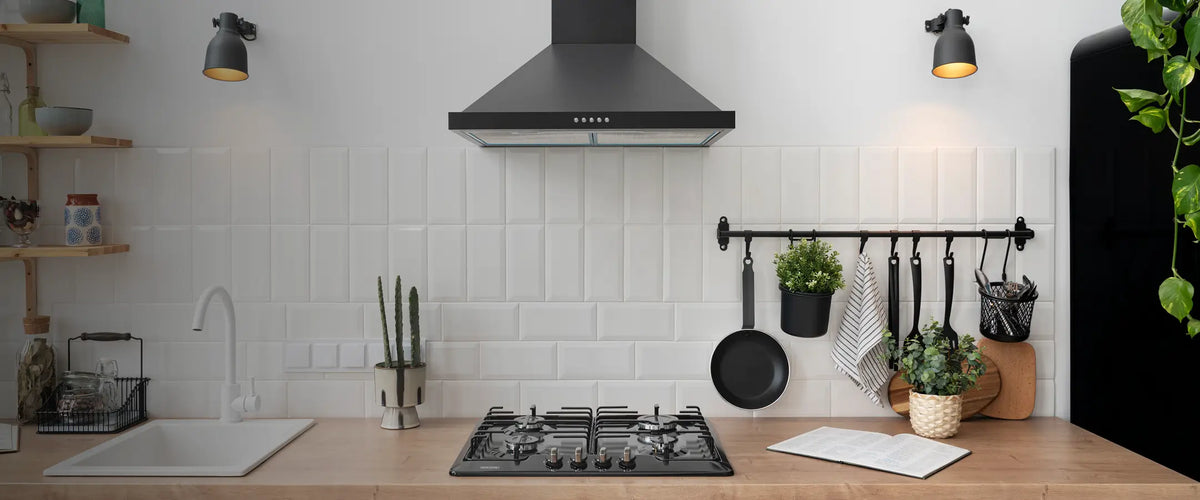 A warm SOFIE Home kitchen with SMEG appliances