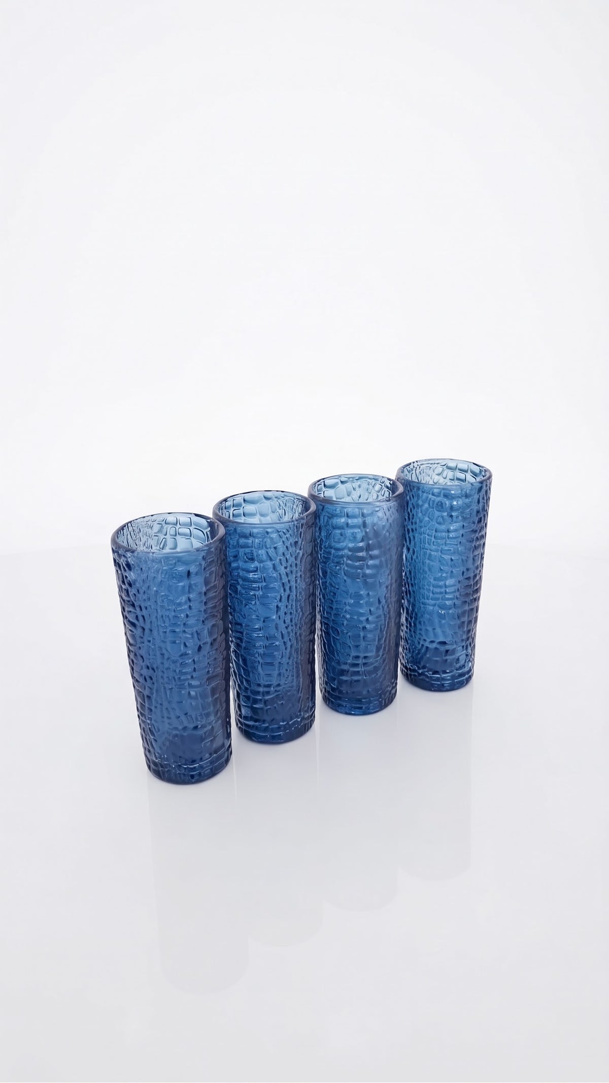 Autobiography" Blue Textured Shot Glasses – Set of 4 2.37oz blue cups